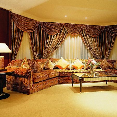 Grand Regency Doha, Trademark Collection By Wyndham Dış mekan fotoğraf A living room