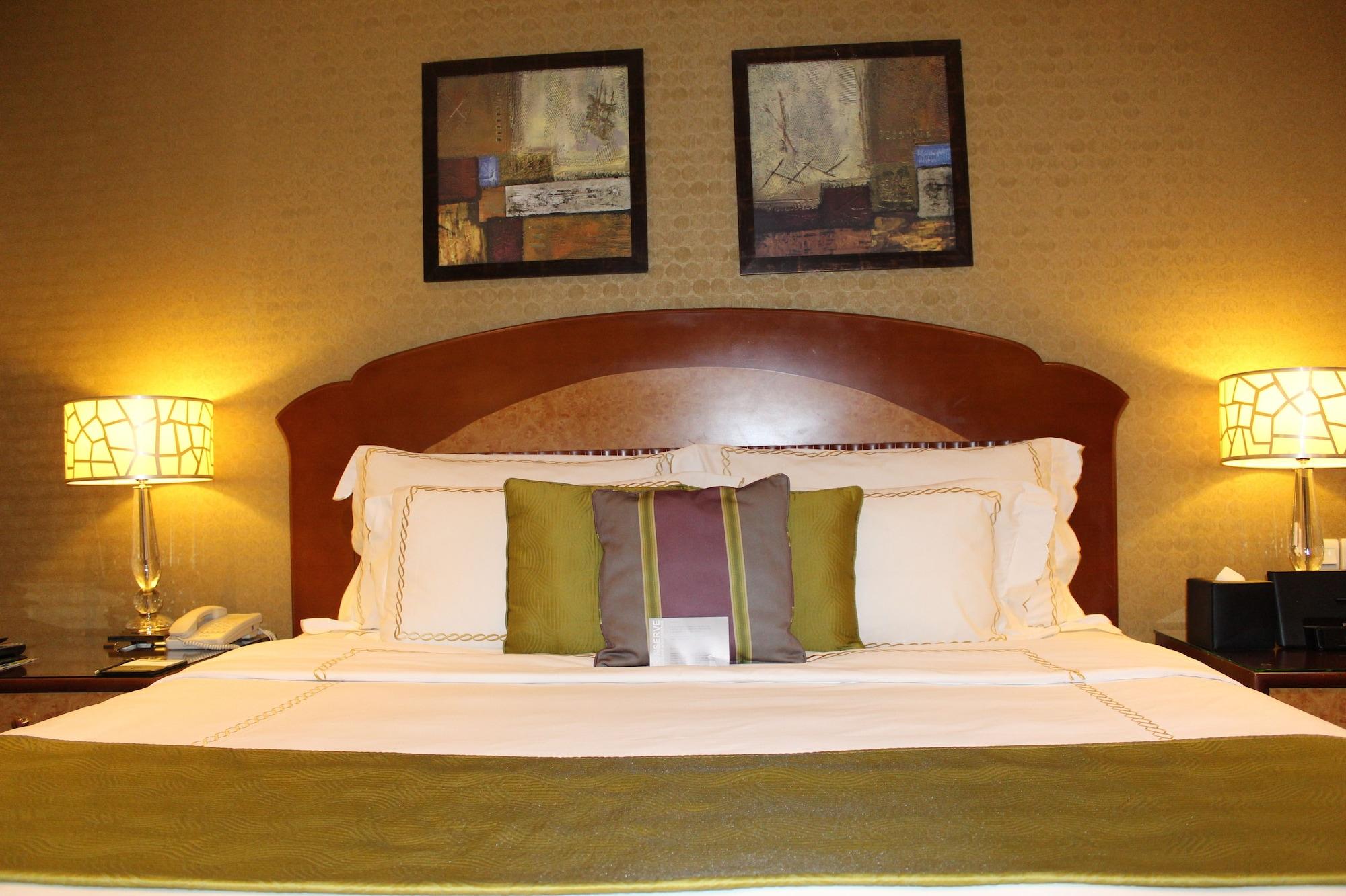 Grand Regency Doha, Trademark Collection By Wyndham Dış mekan fotoğraf A bedroom at the hotel